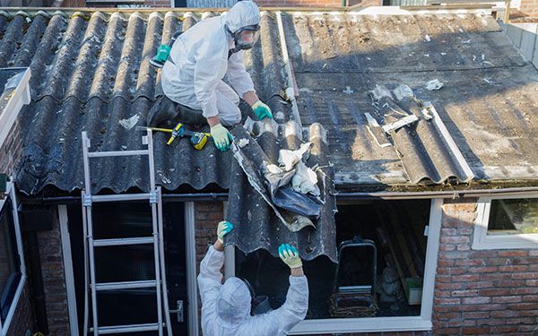 B&R Environmental team members removing asbestos