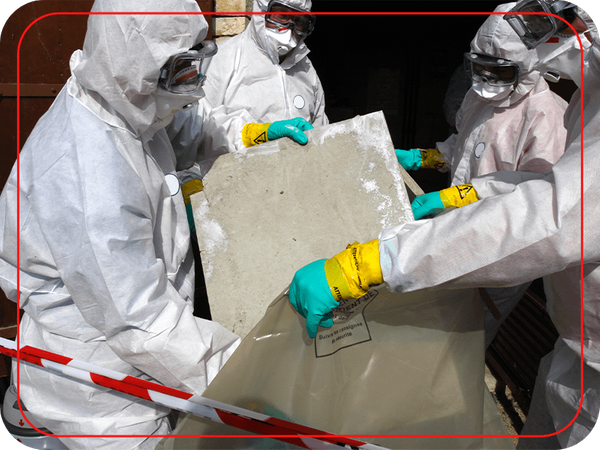 Specialists in hazmat suits removing asbestos