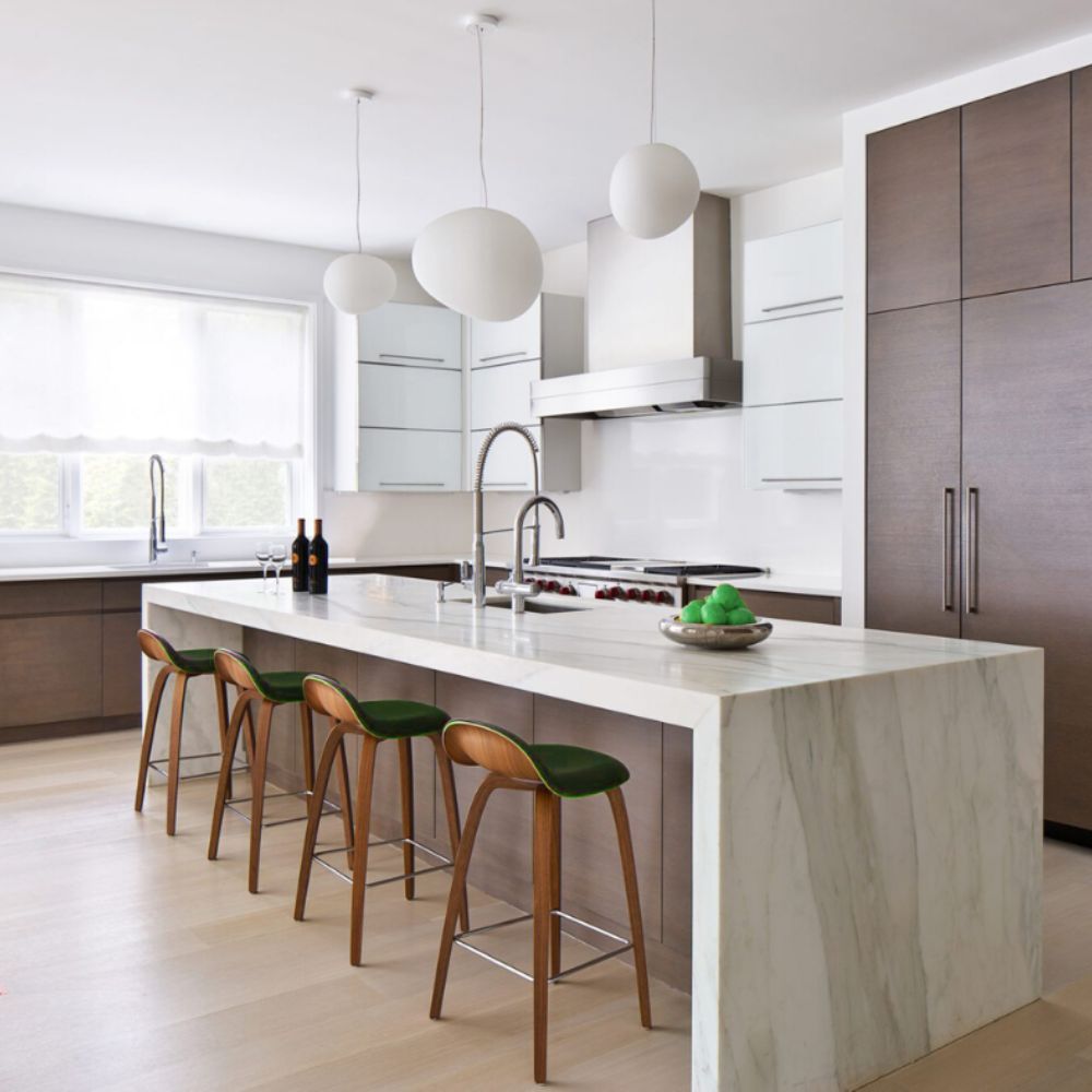 a seamless marble kitchen island in a modern kitchen