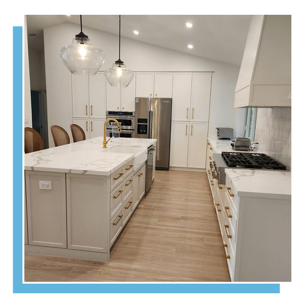 kitchen with white cabinets and quartz counter tops