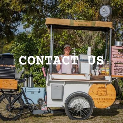 coffee cart with contact us across it
