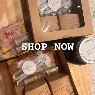 coffee cart with shop now across it