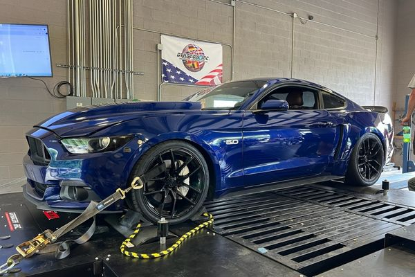 blue car having dyno testing performed blue car having dyno testing performed