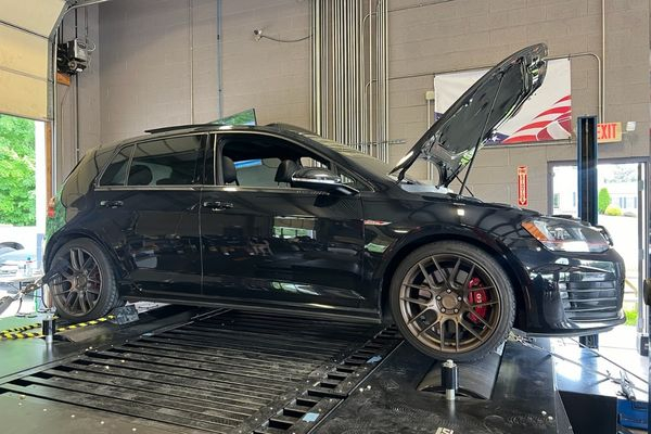 Car hood popped open inside of garage Car hood popped open inside of garage