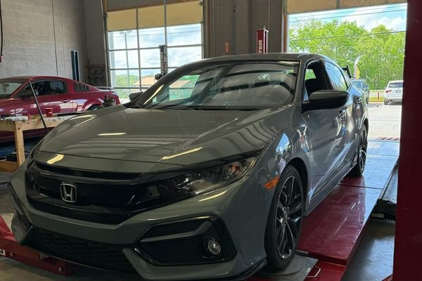 Repaired car in bay Repaired car in bay