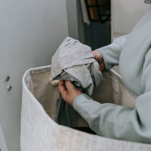 person sorting laundry