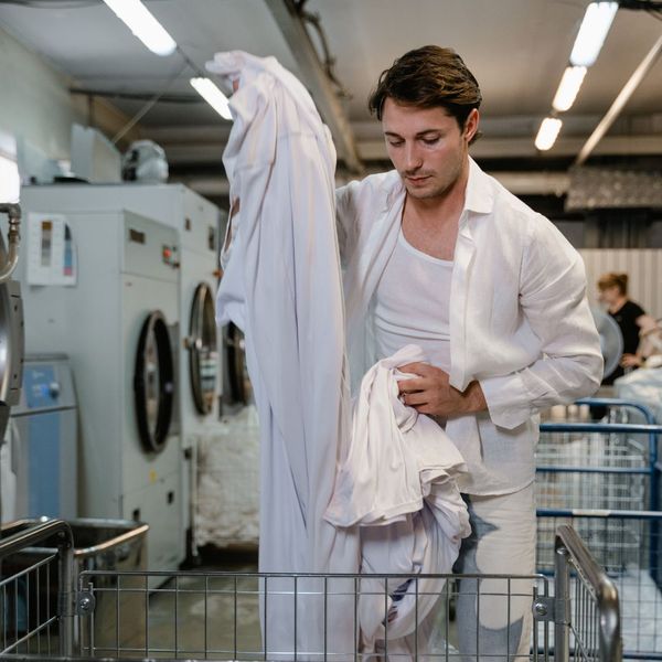 man doing laundry