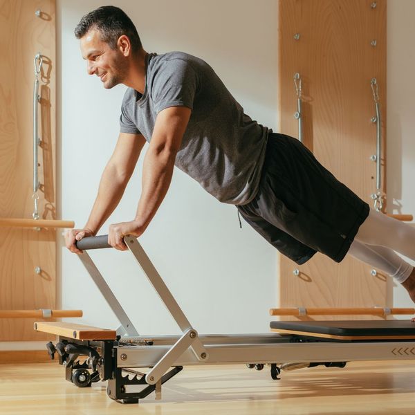 Person balancing on a bar