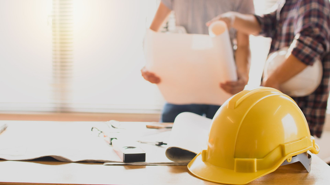 general contractors working on a home remodel plan