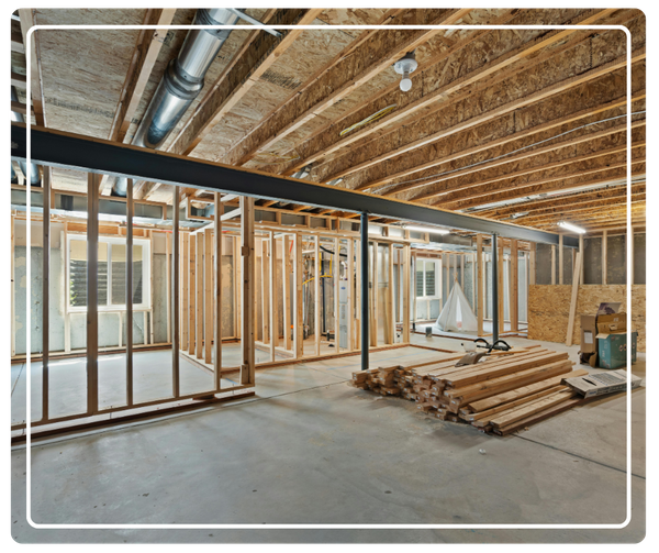 Interior framing and structural work for a custom home / room addition in Pinellas Park, FL, showing professional wood studs and ductwork installation.