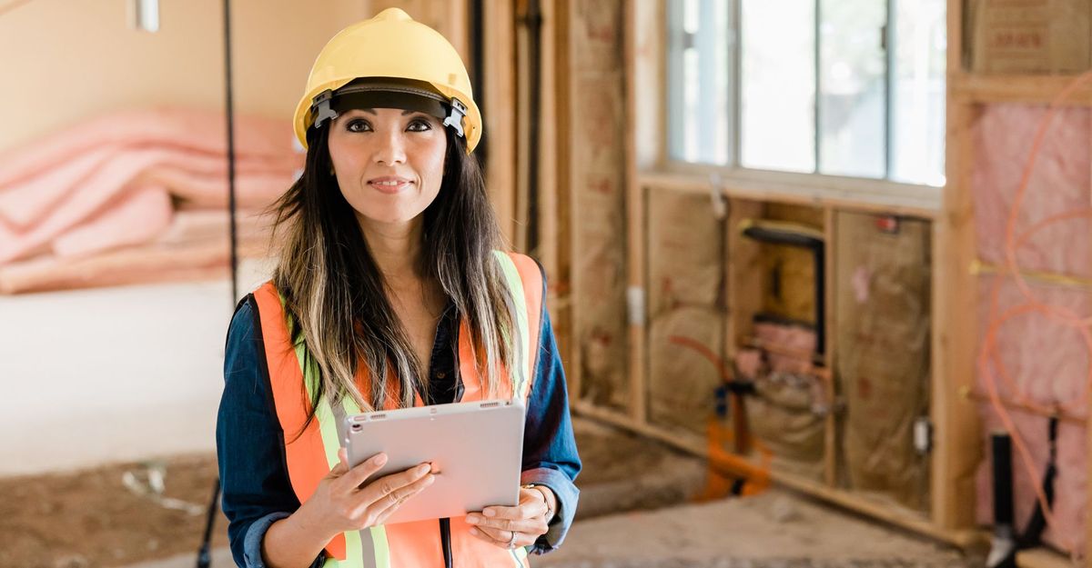 A female contractor with a tablet