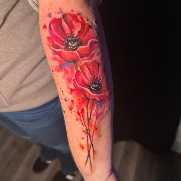 unique flower watercolor tattoo