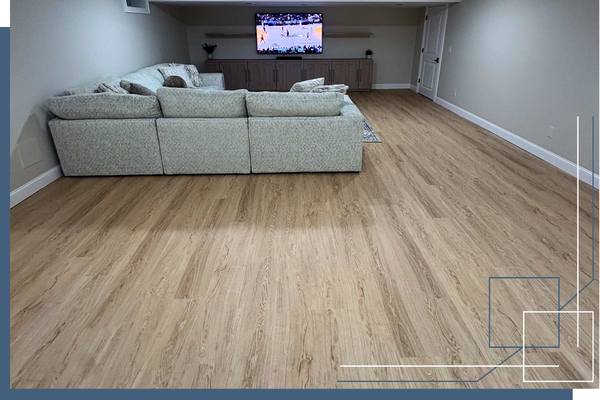 flooring installation in a renovated basement by Blue Ridge Custom Carpentry