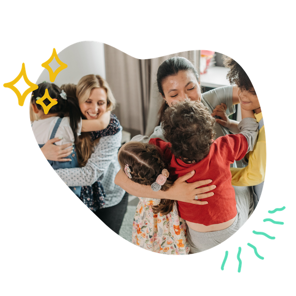 children giving hugs at daycare