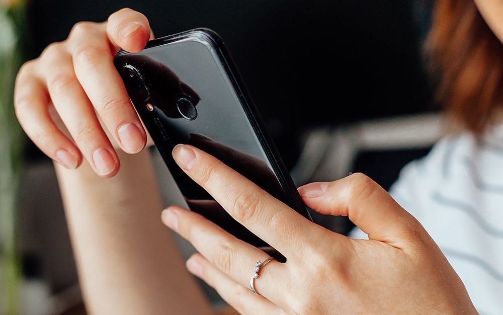 woman checking cell phone