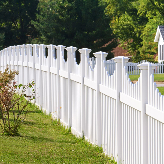a white vinyl fence