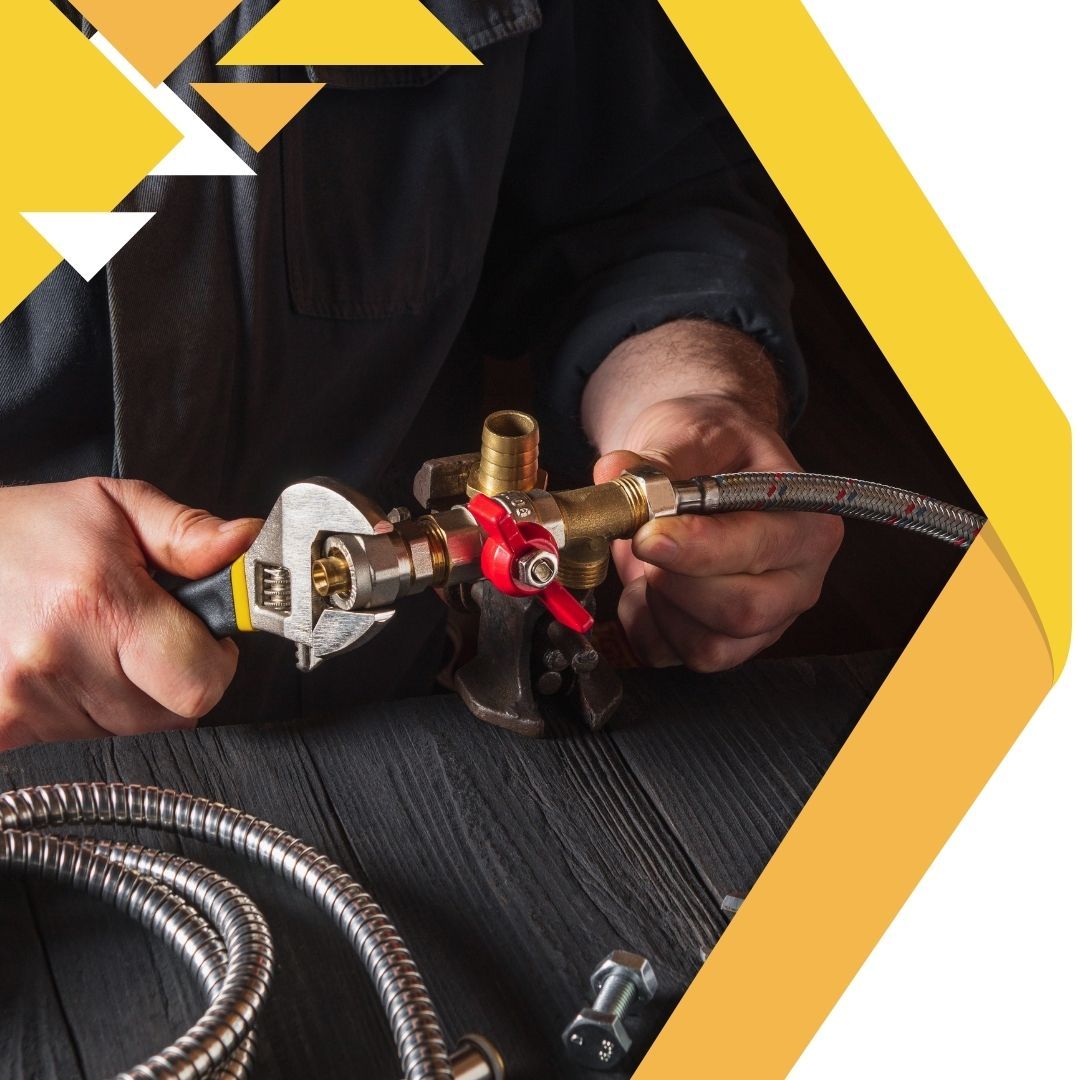plumber working on a connection 