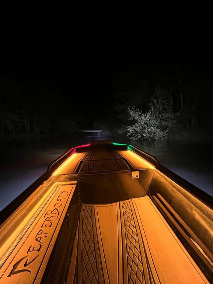 glowing boat at night