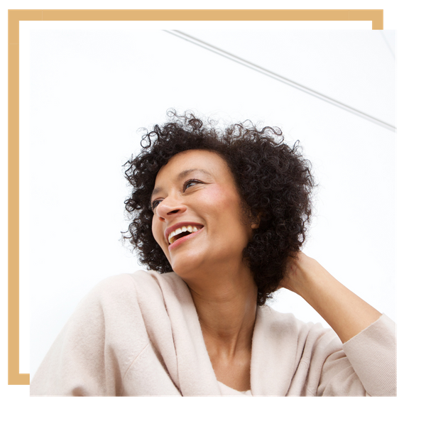 Woman smiling looking past the camera