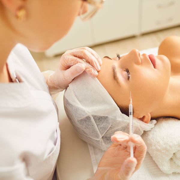 woman receiving dermal fillers