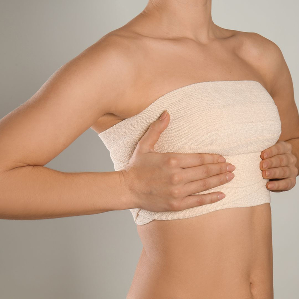 Compression tape around womans chest