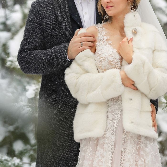 bride and groom during winter wedding