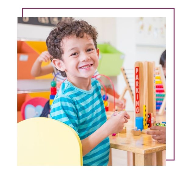 boy playing with toys at daycare