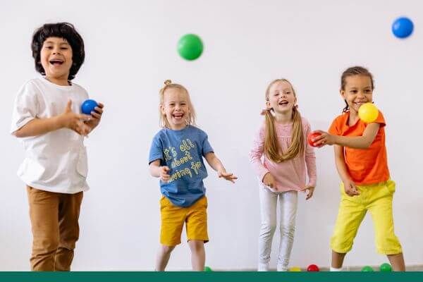 children smiling at childcare facility