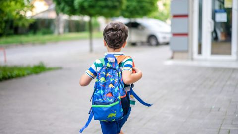 kid wearing a backpack 