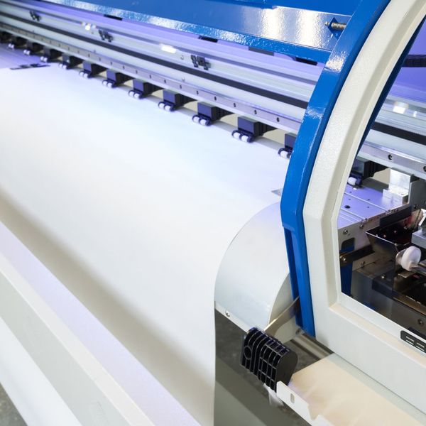 Machine cutting materials. What is Custom Slitting2.jpg