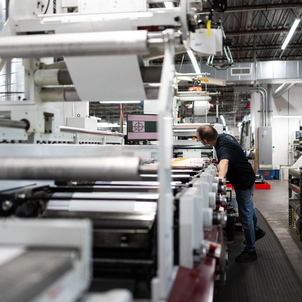 Labels going through machine