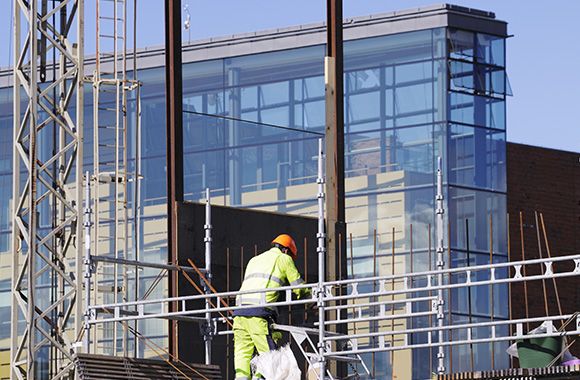 Construction worker on building being built