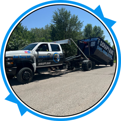 scrapy bins truck dropping off dumpster