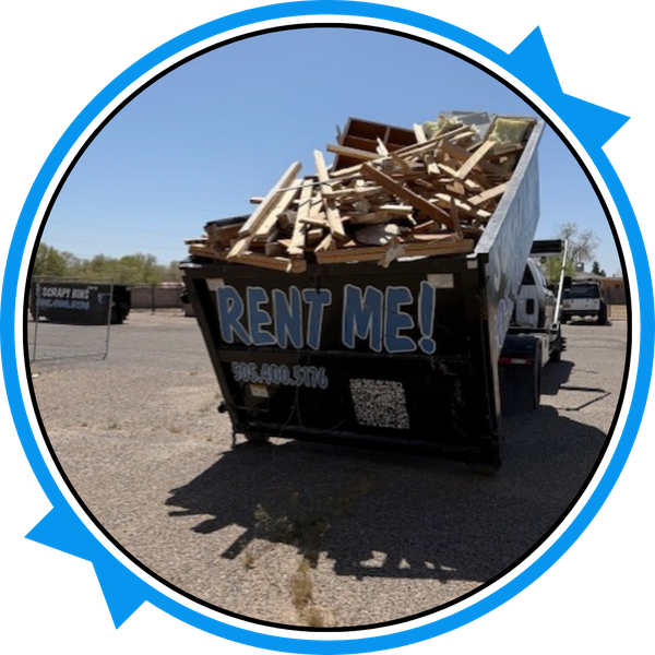 Commercial Dumpster full of wood