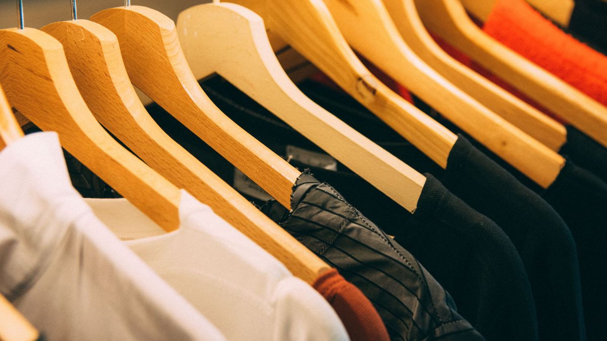 shirts on wooden hangers