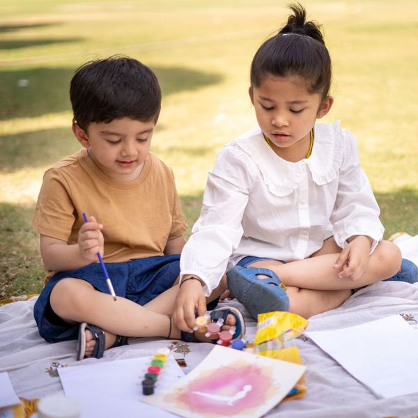 children painting together children painting together