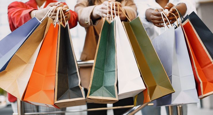 people holding shopping bags Keeping Customers And Employees Safe With Fire Protection Hero.jpg