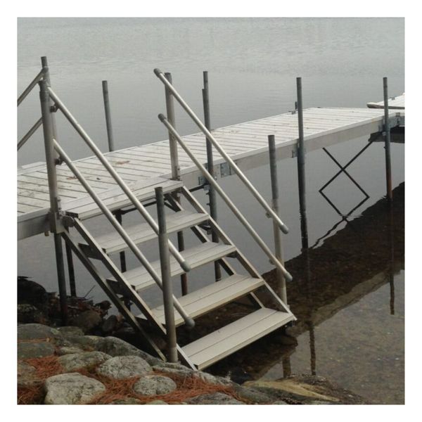 small aluminum stairs on a dock