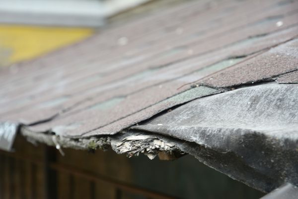 Baldwin, PA, home with damaged shingles.