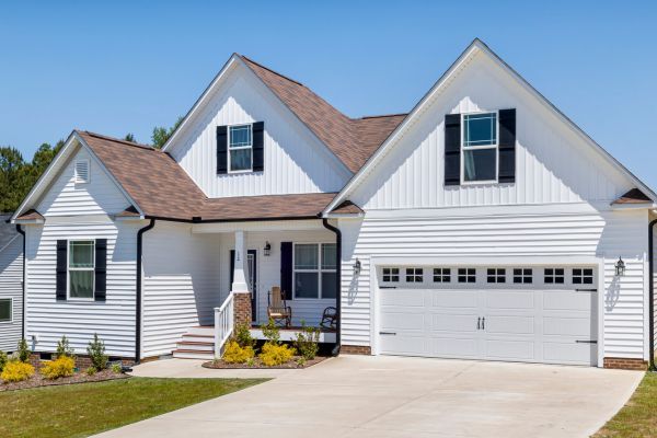 Home with white siding Home with white siding