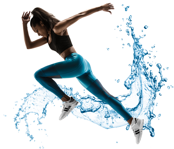 Woman running with water splash