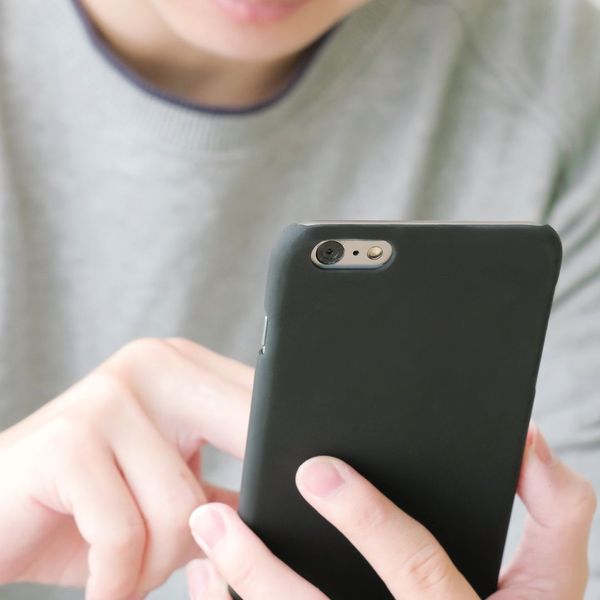 close up of a person using a smart phone