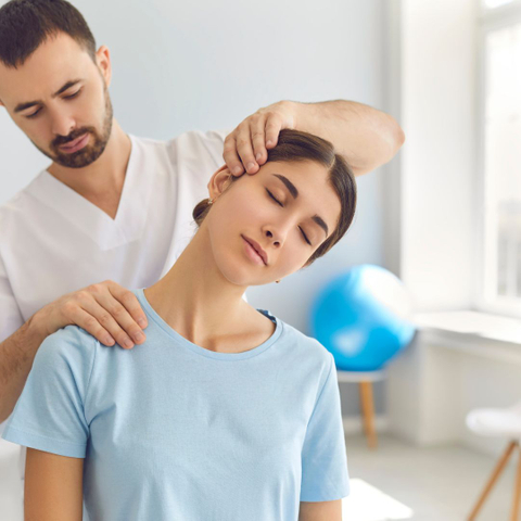 therapist working on neck 