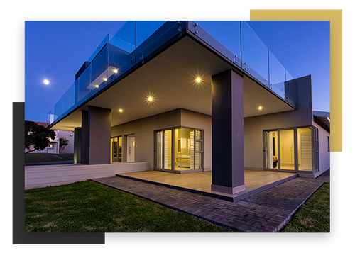 outdoor lighting on back patio of modular modern house