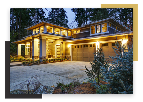 large home with outdoor lighting