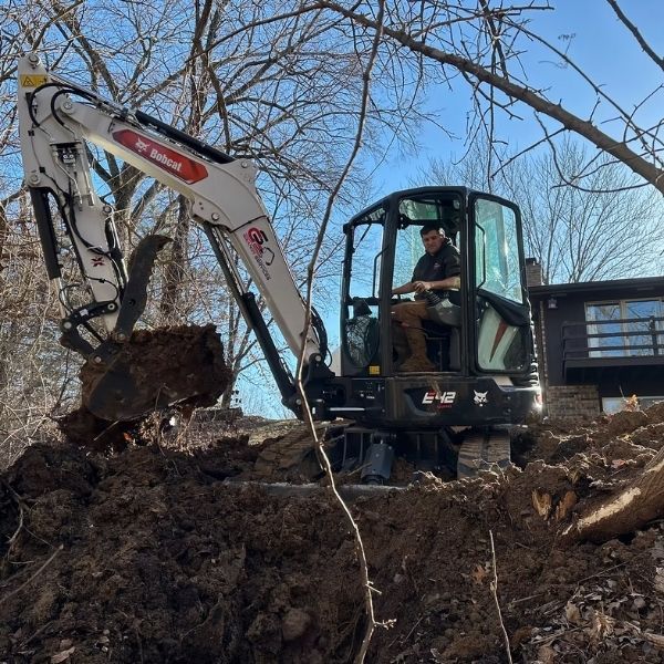 Employee in excavator