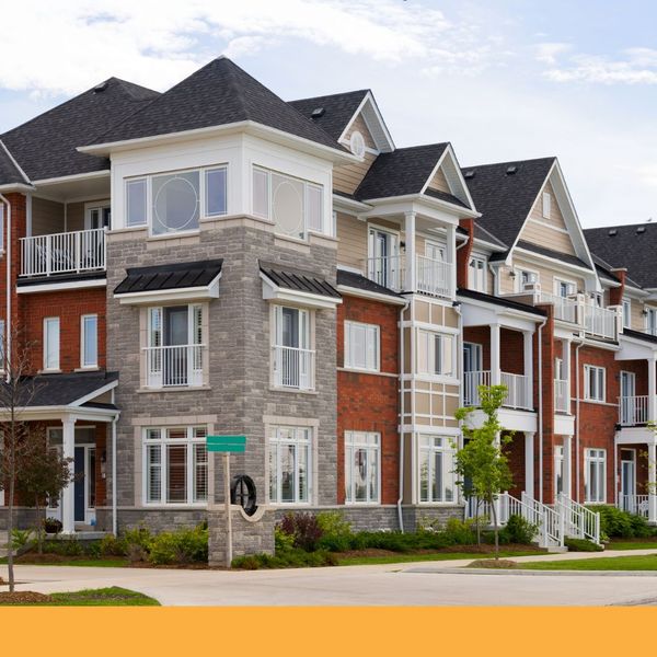 Row of modern townhouses with clean roof Row of modern townhouses with clean roof