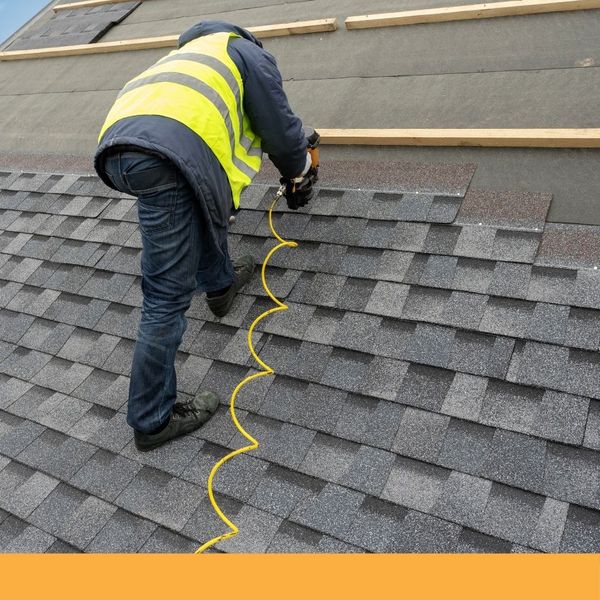 roofer installing shingles roofer installing shingles