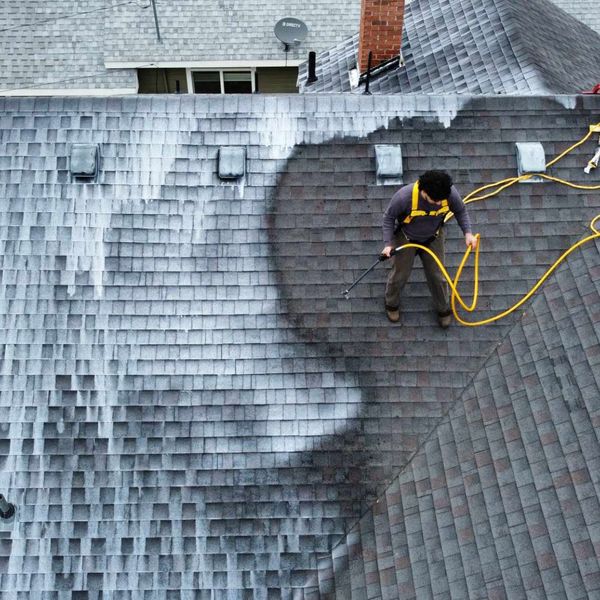 Roof being cleaned 