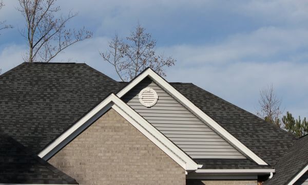 a house with an asphalt shingle roof